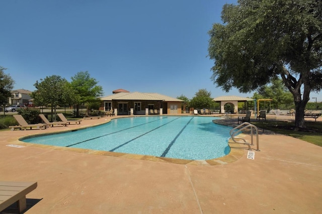 3320 Magellan Ct, Round Rock, TX 78665 - community pool featuring a patio area