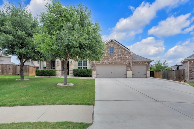 3320 Magellan Ct, Round Rock, TX 78665 - obstructed view of property with concrete driveway, a garage, and brick siding