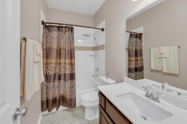 bathroom featuring toilet, vanity, shower / tub combo with curtain, and tile patterned floors