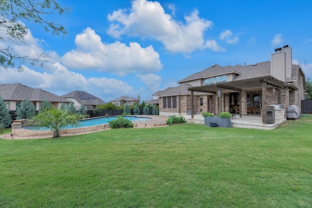 back of property featuring a pergola, a patio, a lawn, a chimney, and roof with shingles