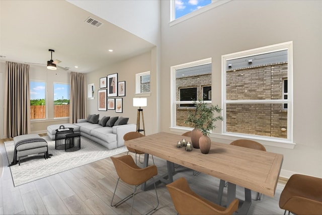 1401 S Brook Dr, Leander, TX 78641 - living area with healthy amount of natural light, wood finished floors, ceiling fan, and recessed lighting