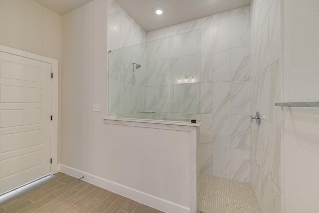 1401 S Brook Dr, Leander, TX 78641 - full bathroom with a walk in shower, wood finish floors, and recessed lighting