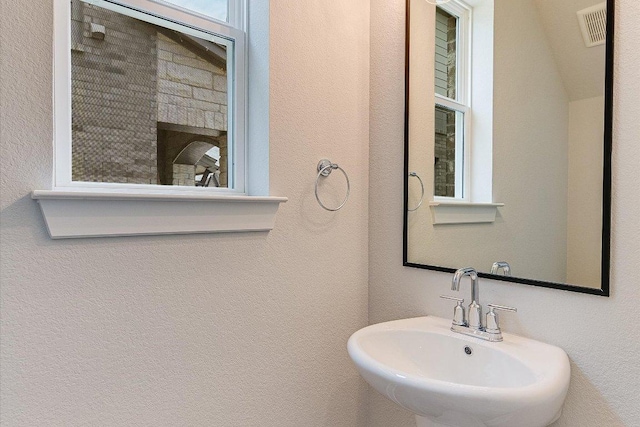 1401 S Brook Dr, Leander, TX 78641 - bathroom with a sink
