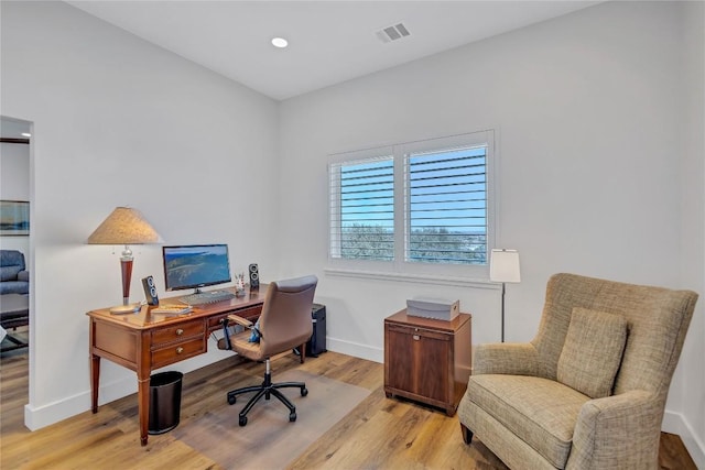 office area featuring wood finished floors, baseboards, and recessed lighting