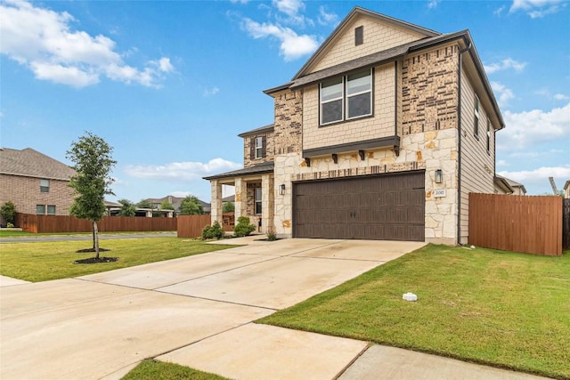 traditional-style house featuring stone siding, a garage, and concrete driveway