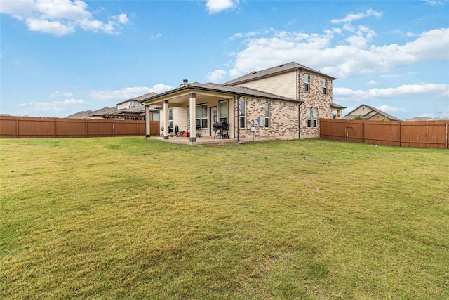 back of house featuring a patio area