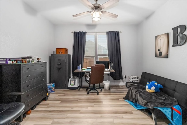 office area featuring a ceiling fan and wood finished floors