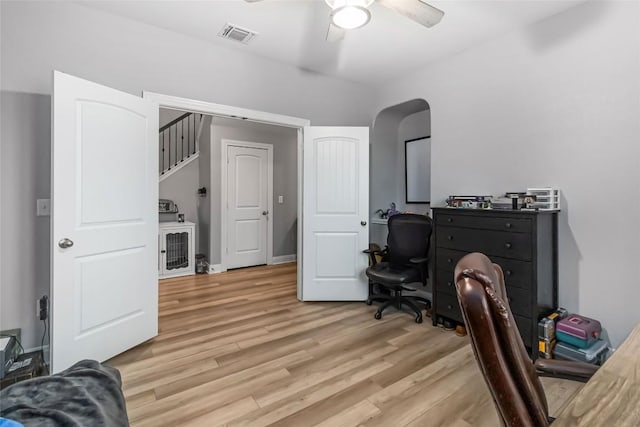 office space featuring light wood-style flooring and ceiling fan