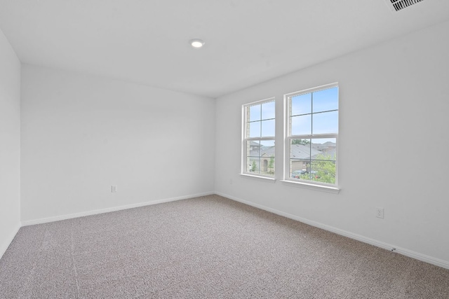2416 Cattle Baron Trl, Leander, TX 78641 - spare room with carpet, baseboards, and recessed lighting