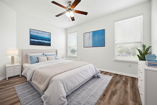2500 Mcdonald Way, Austin, TX 78754 - bedroom with multiple windows, wood finished floors, and ceiling fan