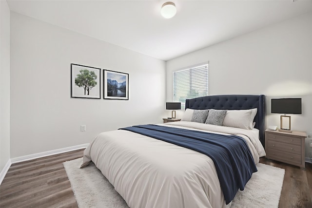 2500 Mcdonald Way, Austin, TX 78754 - bedroom with baseboards and wood finished floors