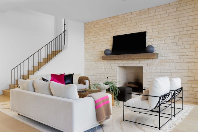 4405 Hennig Dr, Austin, TX 78738 - living room with stairs, wood finished floors, and a fireplace
