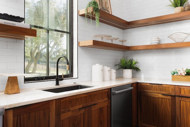 4405 Hennig Dr, Austin, TX 78738 - kitchen with open shelves, stainless steel dishwasher, a sink, and light countertops