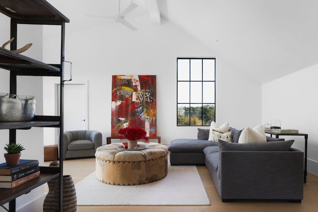 4405 Hennig Dr, Austin, TX 78738 - living area featuring high vaulted ceiling, wood finished floors, beamed ceiling, and a ceiling fan