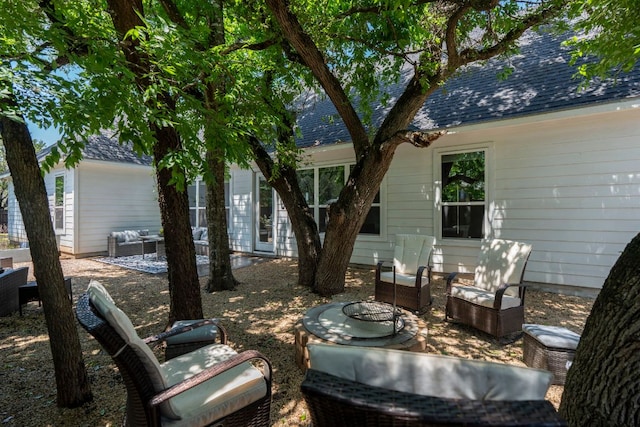 4 La Toya Trl, Wimberley, TX 78676 - rear view of property featuring outdoor lounge area and a patio