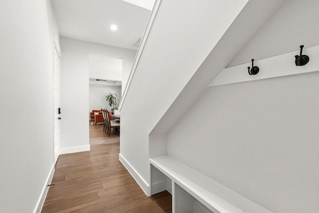 mudroom featuring dark wood-style floors, baseboards, and recessed lighting