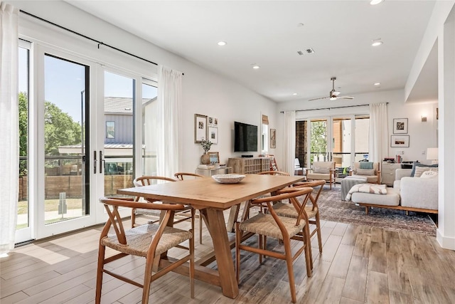 4609 Unity Cir, Austin, TX 78731 - dining room featuring light wood-style flooring, a ceiling fan, and recessed lighting