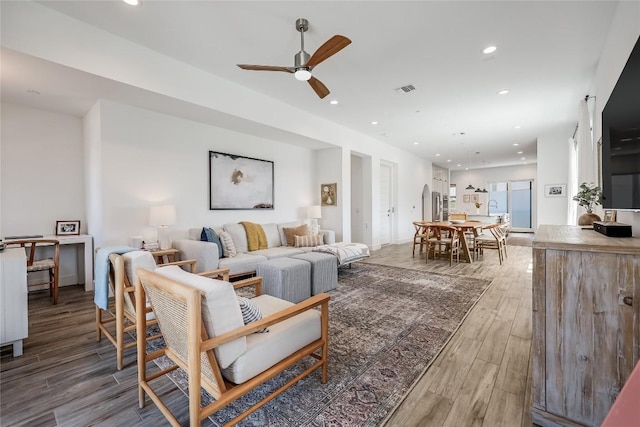 4609 Unity Cir, Austin, TX 78731 - living room featuring a ceiling fan, light wood-style flooring, and recessed lighting