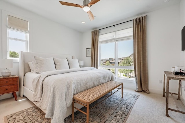 4609 Unity Cir, Austin, TX 78731 - bedroom with light carpet, ceiling fan, and recessed lighting