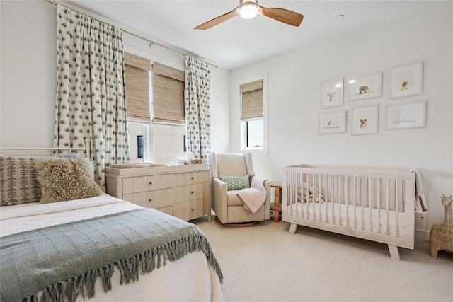 4609 Unity Cir, Austin, TX 78731 - bedroom with light colored carpet, a ceiling fan, and radiator