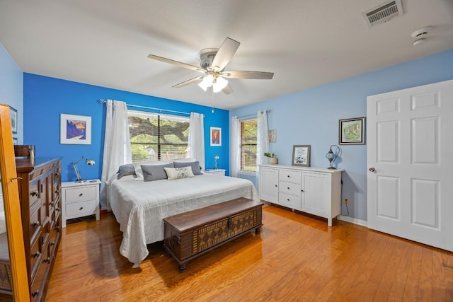 315 Juniper Dr, Mountain City, TX 78610 - bedroom featuring light wood-style flooring and ceiling fan