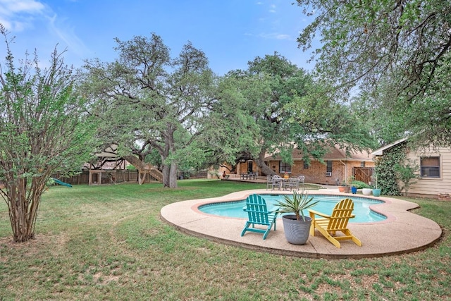 315 Juniper Dr, Mountain City, TX 78610 - swimming pool with a patio and a playground