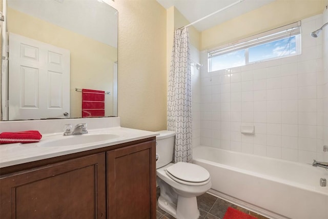 full bath with toilet, vanity, shower / bath combination with curtain, and tile patterned flooring