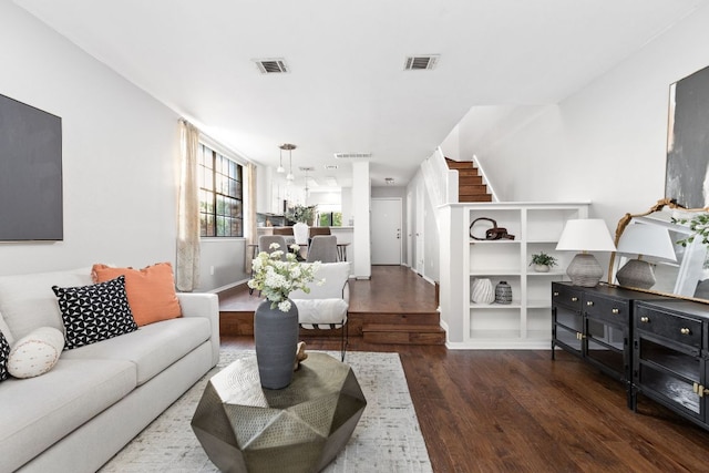 7122 Wood Hollow Dr Unit 13, Austin, TX 78731 - living area with wood finished floors and stairs