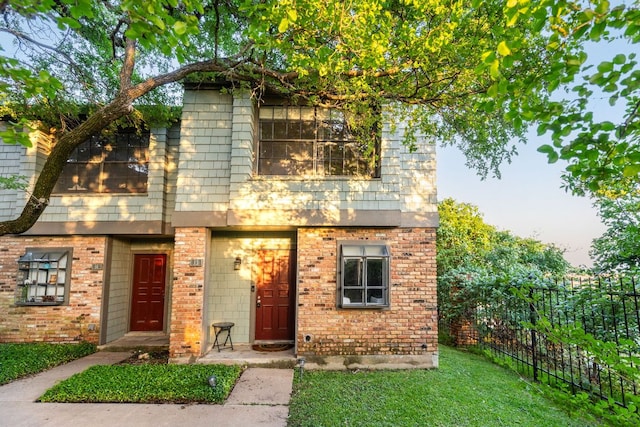 7122 Wood Hollow Dr Unit 13, Austin, TX 78731 - view of front of property featuring brick siding