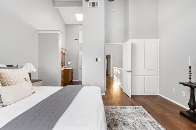 7122 Wood Hollow Dr Unit 13, Austin, TX 78731 - bedroom featuring high vaulted ceiling and wood finished floors