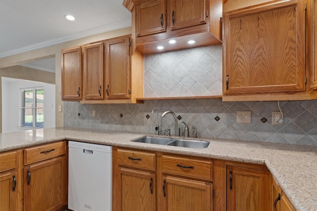 531 Dennis Dr, Round Rock, TX 78664 - kitchen featuring dishwasher, a sink, tasteful backsplash, crown molding, and brown cabinets