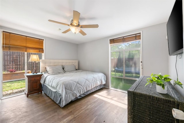 5900 Nasco Dr, Austin, TX 78757 - bedroom with access to outside, wood finished floors, and a ceiling fan