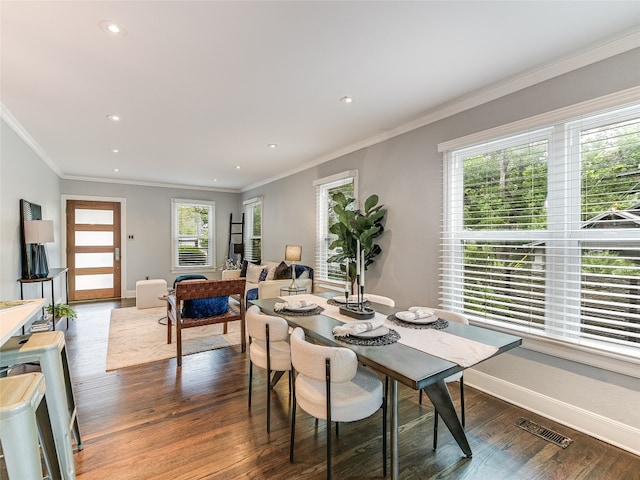 701 Bouldin Ave, Austin, TX 78704 - dining space featuring plenty of natural light, wood finished floors, recessed lighting, and ornamental molding
