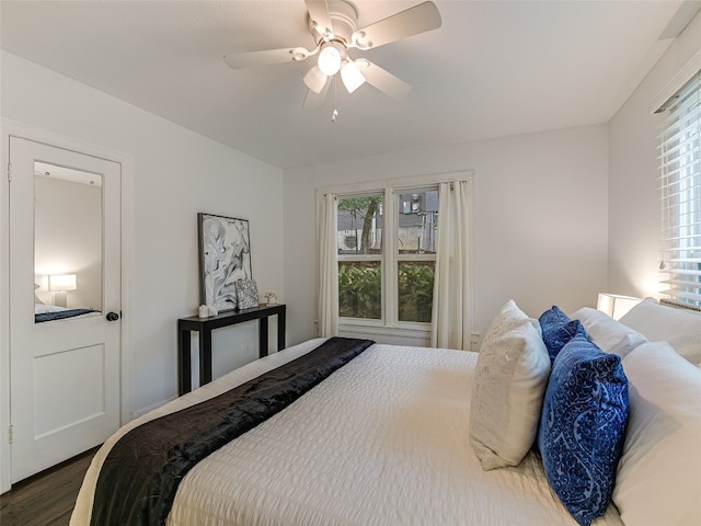 701 Bouldin Ave, Austin, TX 78704 - bedroom featuring wood finished floors and ceiling fan
