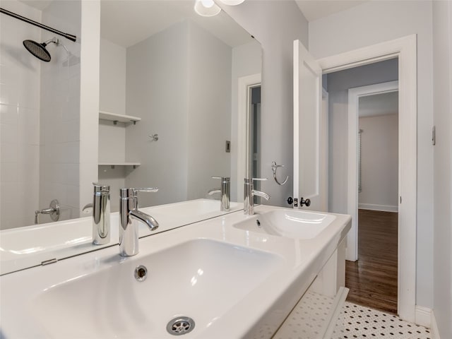 701 Bouldin Ave, Austin, TX 78704 - bathroom featuring double vanity and a shower