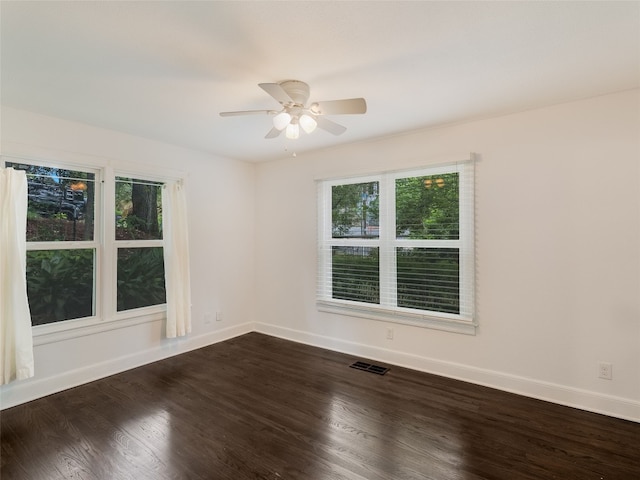 701 Bouldin Ave, Austin, TX 78704 - spare room featuring dark wood-style floors and a ceiling fan