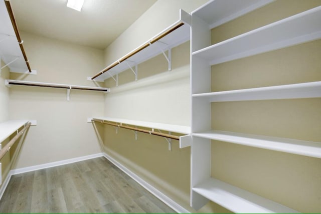 4924 Pyrenees Pass, Bee Cave, TX 78738 - spacious closet with wood finished floors