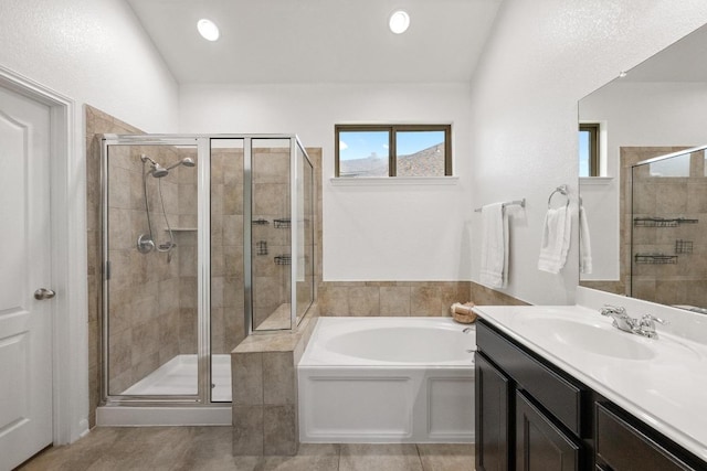 4924 Pyrenees Pass, Bee Cave, TX 78738 - full bathroom with a bath, a shower stall, vanity, tile patterned floors, and recessed lighting