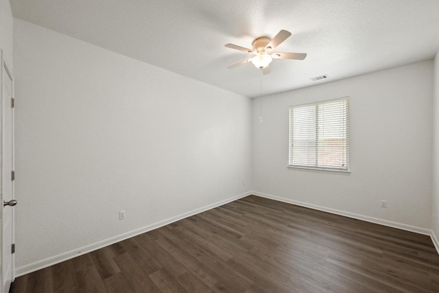4924 Pyrenees Pass, Bee Cave, TX 78738 - spare room featuring a ceiling fan and dark wood-type flooring