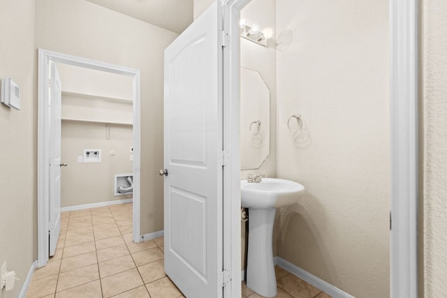 2880 Donnell Dr Unit 3903, Round Rock, TX 78664 - bathroom with tile patterned flooring, baseboards, and a sink