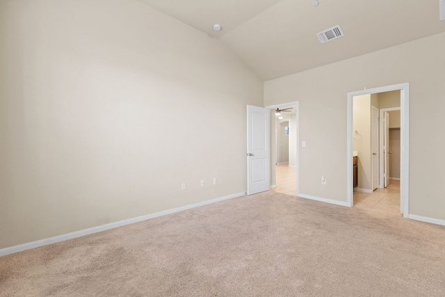 2880 Donnell Dr Unit 3903, Round Rock, TX 78664 - unfurnished bedroom featuring light colored carpet, vaulted ceiling, and baseboards