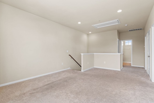 2880 Donnell Dr Unit 3903, Round Rock, TX 78664 - empty room with attic access, light carpet, baseboards, and recessed lighting