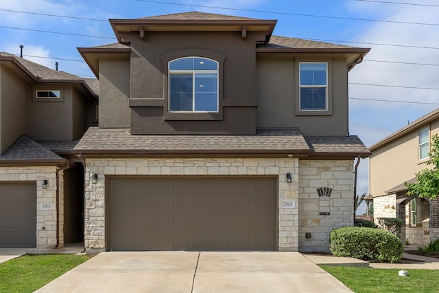 2880 Donnell Dr Unit 3903, Round Rock, TX 78664 - multi unit property featuring stone siding, an attached garage, stucco siding, and concrete driveway