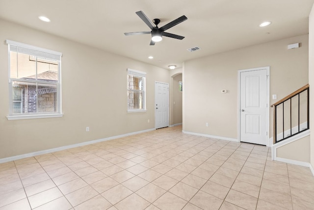 2880 Donnell Dr Unit 3903, Round Rock, TX 78664 - unfurnished room with arched walkways, ceiling fan, healthy amount of natural light, stairway, and recessed lighting