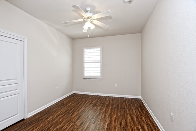 212 Yukon Ter, Georgetown, TX 78633 - unfurnished room featuring dark wood finished floors, baseboards, and ceiling fan