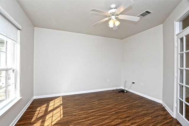 212 Yukon Ter, Georgetown, TX 78633 - unfurnished room featuring wood finished floors, ceiling fan, and baseboards