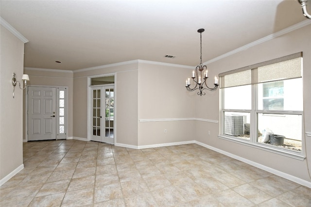 212 Yukon Ter, Georgetown, TX 78633 - foyer entrance featuring plenty of natural light, crown molding, a chandelier, baseboards, and light tile patterned floors