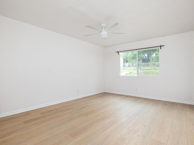 2522 Chaparral Trl, Austin, TX 78744 - unfurnished room featuring light wood-style floors and a ceiling fan