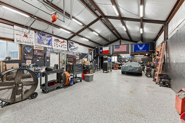 garage with a workshop area