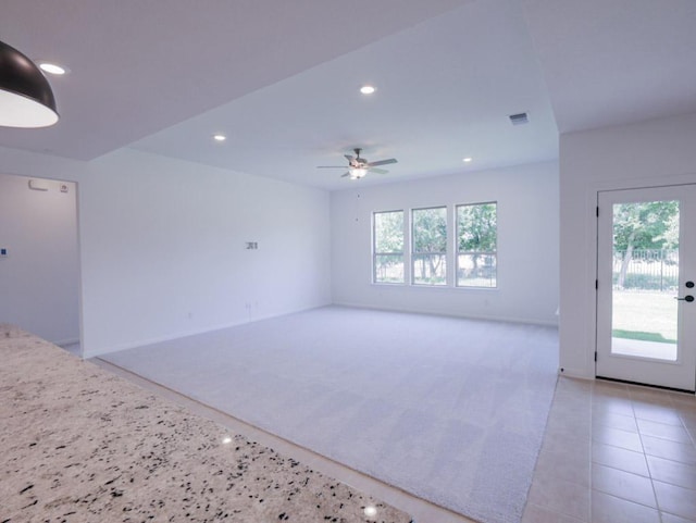 1709 Cayuga St, Leander, TX 78641 - unfurnished room featuring ceiling fan, recessed lighting, baseboards, and light colored carpet
